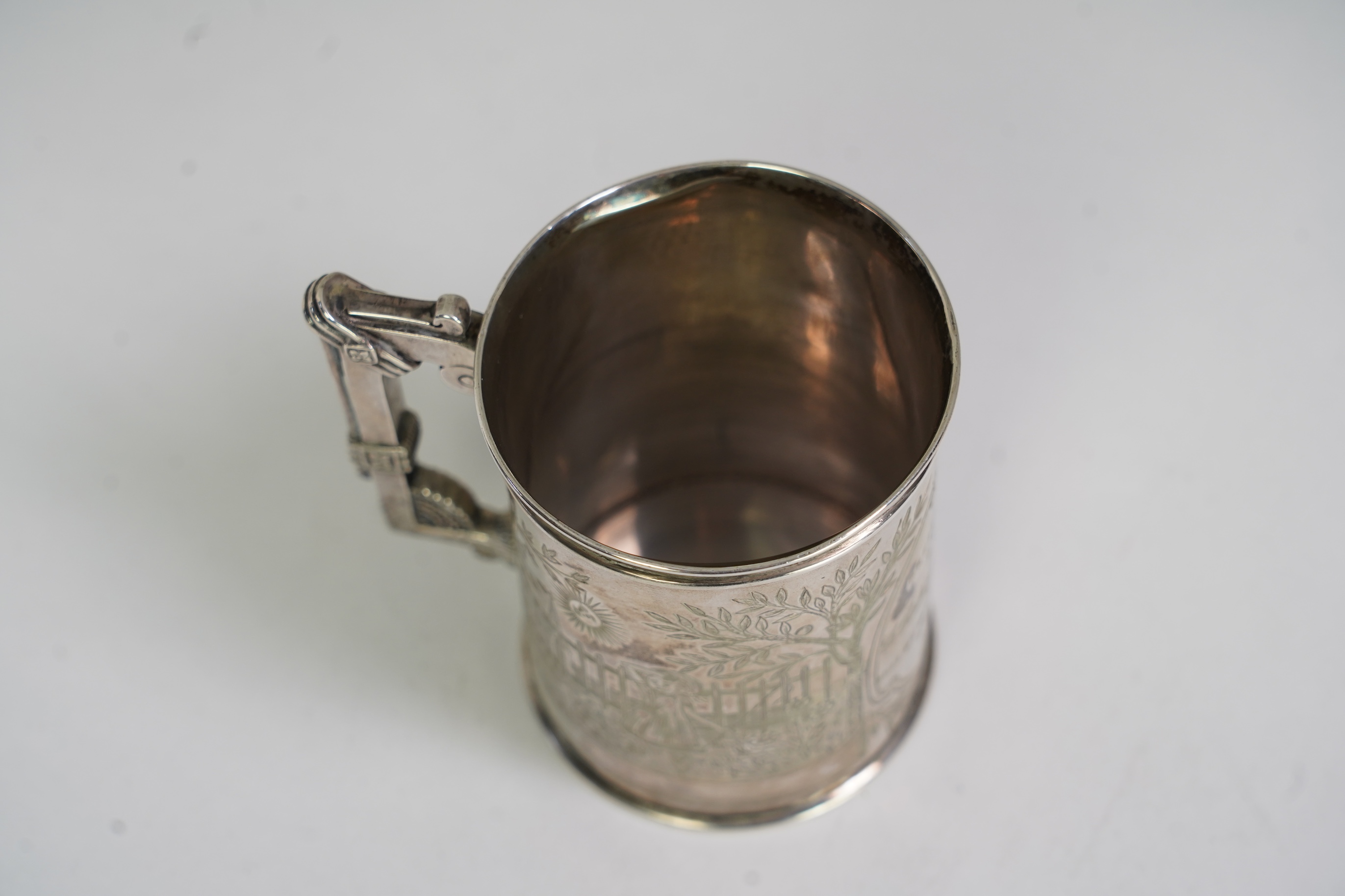 A 19th century Indian colonial white metal christening mug, by P. Orr & Sons, Madras